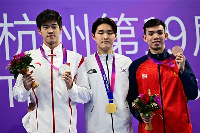 ASIAD 2023: Ngày thi đấu ghi dấu ấn 'kình ngư' Nguyễn Huy Hoàng ảnh 1