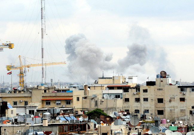 SOHR: Không kích tiếp diễn ở Đông Ghouta bất chấp lệnh ngừng bắn ảnh 1