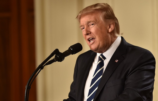 Tổng thống Donald Trump đã làm những gì để thực hiện cam kết của mình? ảnh 1