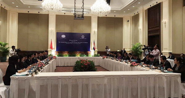 Hai ngân hàng trung ương Việt Nam-Campuchia tăng cường hợp tác ảnh 1