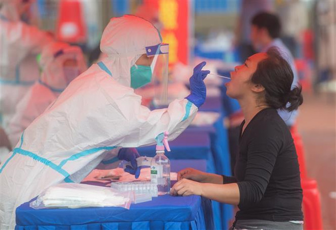 Trung Quốc không ghi nhận thêm ca lây nhiễm trong cộng đồng ảnh 1