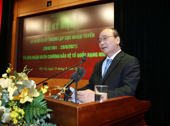 Chủ tịch nước Nguyễn Xuân Phúc phát biểu. (Ảnh: Phạm Kiên/TTXVN) Chiến sỹ lực lượng ngoại tuyến tô thắm thêm truyền thống anh hùng CAND ảnh 2
