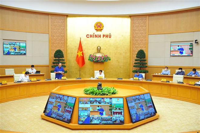 Quang cảnh hội nghị. (Ảnh: Minh Đức/TTXVN) Đảm bảo đủ vật liệu xây dựng, không lùi tiến độ cao tốc Bắc-Nam ảnh 1