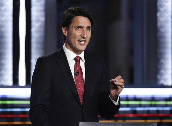 Thủ tướng Justin Trudeau phát biểu tại Quebec, Canada. (Ảnh: AFP/TTXVN) Thủ tướng Canada bảo vệ việc tổ chức sự kiện có 400 người tham dự ảnh 1