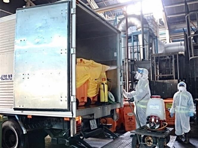 Rác thải y tế ở tâm dịch: Đảm bảo an toàn cho chiến binh thầm lặng ảnh 2