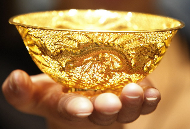 Đồng USD yếu, giá vàng trên thị trường châu Á khá ổn định ảnh 1