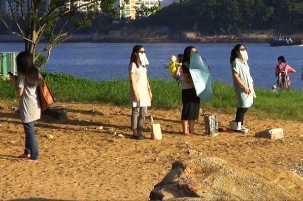 Sửng sốt với cách giảm cân nhờ nhìn Mặt Trời của các cô gái Hong Kong ảnh 4