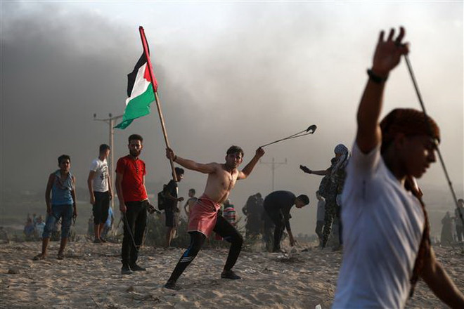 Các nhóm vũ trang Palestine tuyên bố ngừng bắn với Israel ảnh 1