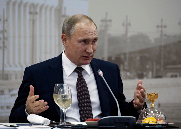 Ông Putin cáo buộc Thủ tướng Anh dùng Brexit để "hăm dọa" châu Âu ảnh 1