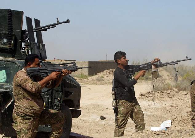 Iraq giành lại trụ sở chính quyền ở Fallujah từ tay IS ảnh 1