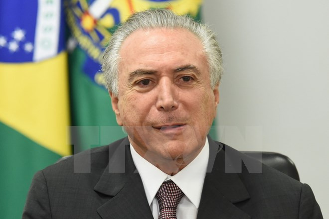 Tổng thống lâm thời Brazil Michel Temer. (Ảnh: AFP/TTXVN) Tổng thống lâm thời Brazil bị tố cáo dính líu tới vụ tham ô Petrobras ảnh 1