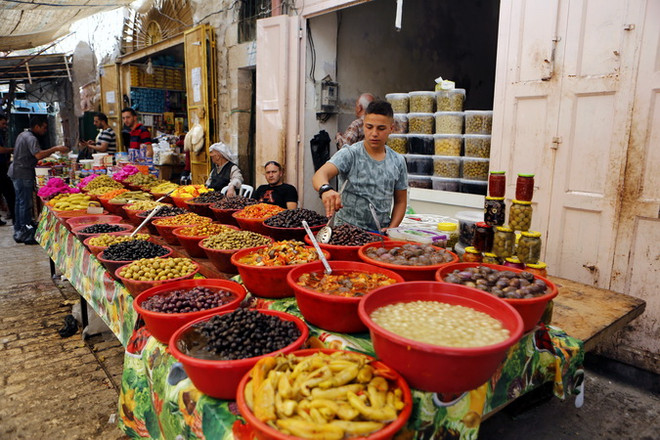 WB hạ dự báo tăng trưởng kinh tế toàn cầu xuống còn 2,4% trong 2016 ảnh 1