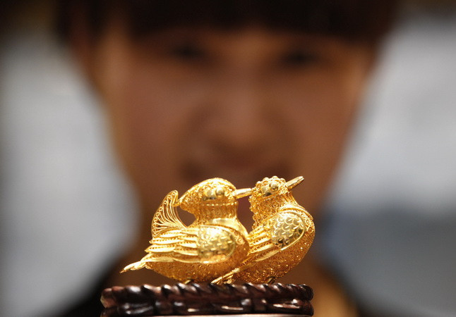 Giá vàng trên thị trường châu Á vẫn giữ vững đà tăng ảnh 1