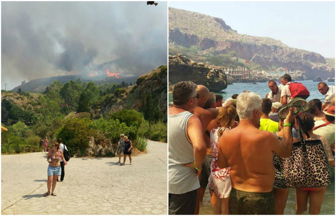Cháy rừng lan rộng ở khu nghỉ mát, du khách phải sơ tán bằng thuyền ảnh 1