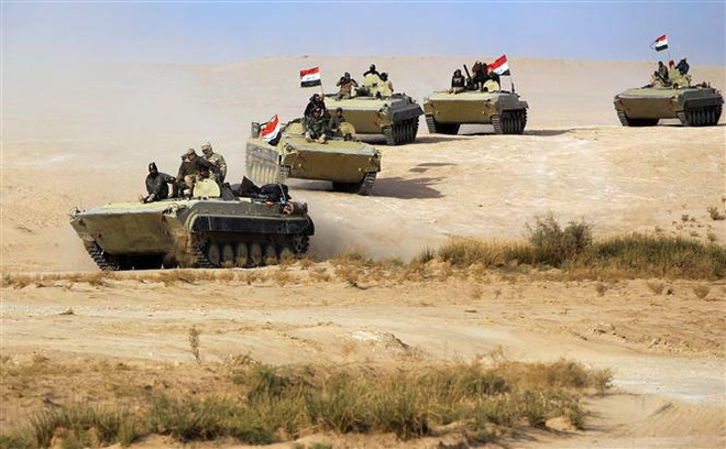 Quân đội Iraq. (Nguồn: AFP/TTXVN) Quân đội Iraq đặt trong tình trạng báo động cao tại biên giới Syria ảnh 1