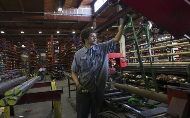 Fed: Kinh tế toàn cầu “hạ nhiệt” sẽ ảnh hưởng tới các nhà chế tạo Mỹ ảnh 1