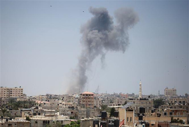 Xe tăng Israel bắn pháo vào vị trí của Hamas ở Dải Gaza ảnh 1