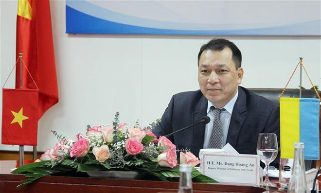 Thứ trưởng Bộ Công Thương Đặng Hoàng An chủ trì khóa họp tại đầu cầu Hà Nội. (Ảnh: Trần Việt/TTXVN) Việt Nam và Ukraine thúc đẩy hợp tác tăng trưởng thương mại ảnh 2