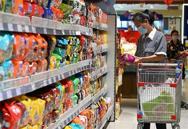 IMF thông báo nâng dự báo tăng trưởng kinh tế Trung Quốc ảnh 1