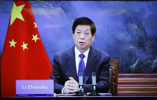 Chủ tịch Nhân đại Trung Quốc Lật Chiến Thư phát biểu. (Ảnh: Doãn Tấn/TTXVN) Chủ tịch Quốc hội hội đàm trực tuyến với Chủ tịch Nhân đại Trung Quốc ảnh 2