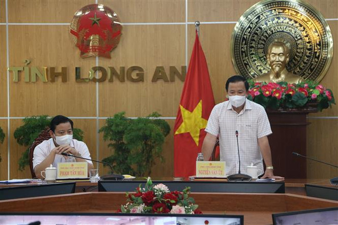 Long An kết thúc áp dụng Chỉ thị 15 tại 5 huyện, thành phố ảnh 1