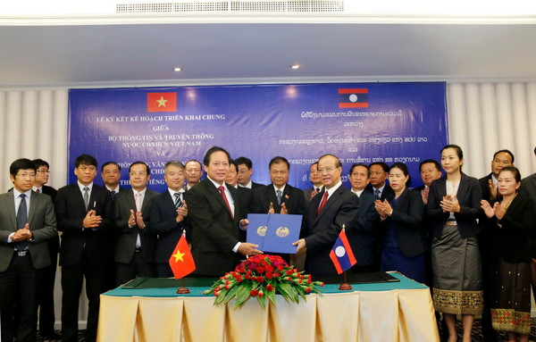Việt Nam và Lào đẩy mạnh hợp tác trong lĩnh vực thông tin ảnh 1