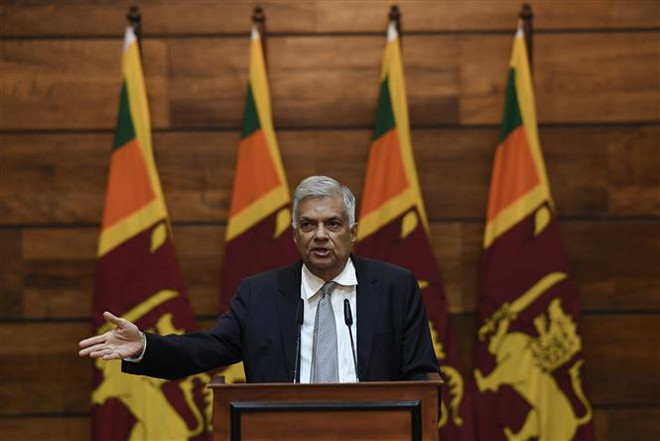 Thủ tướng Sri Lanka Ranil Wickremesinghe sẽ từ chức trong ngày 21/11. (Nguồn: AFP/TTXVN) Thủ tướng Sri Lanka Ranil Wickremesinghe sẽ tuyên bố từ chức ảnh 1