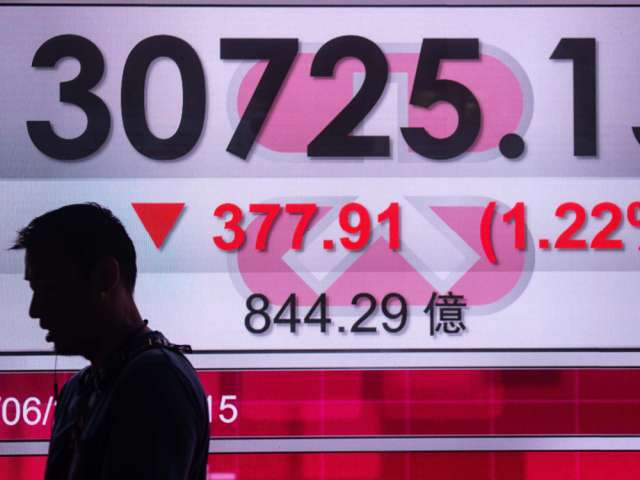 Bảng chỉ số Hang Seng. (Nguồn: AFP/Getty Images) Chứng khoán thị trường châu Á phần lớn giảm điểm trong phiên 14/11 ảnh 1
