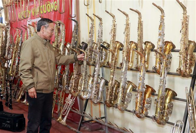 Đến thăm xứ đạo Phạm Pháo - làng sửa kèn đồng duy nhất của cả nước ảnh 2