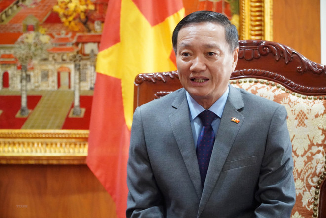 Đại sứ Nguyễn Bá Hùng. (Ảnh: Phạm Kiên/TTXVN) Hợp tác thương mại-đầu tư góp phần củng cố quan hệ Việt-Lào ảnh 1