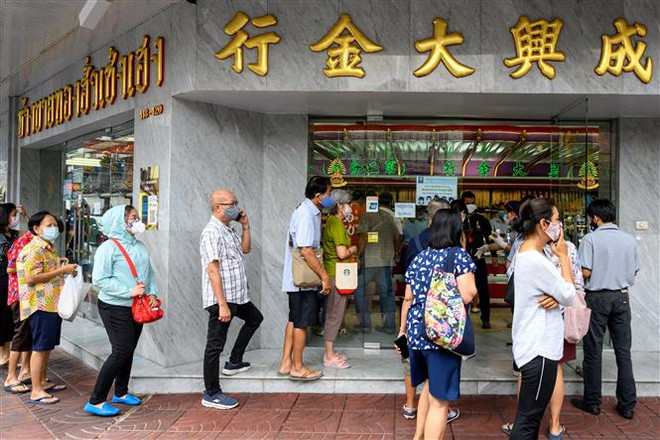 Giá vàng tại thị trường châu Á đi lên trong phiên chiều 15/6 ảnh 1