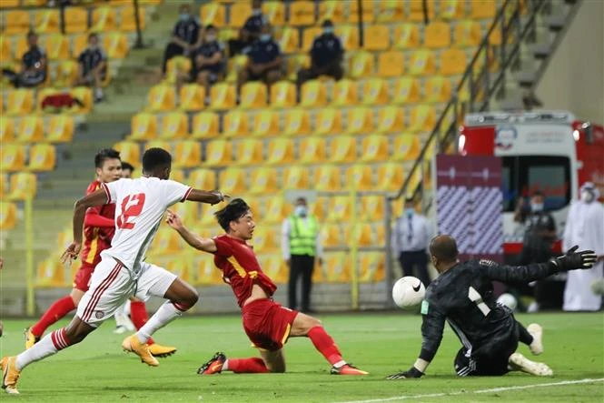 Minh Vương ghi bàn vào lưới tuyển UAE ở vòng loại thứ hai World Cup 2022 hồi tháng 6 vừa qua. (Ảnh: TTXVN) 