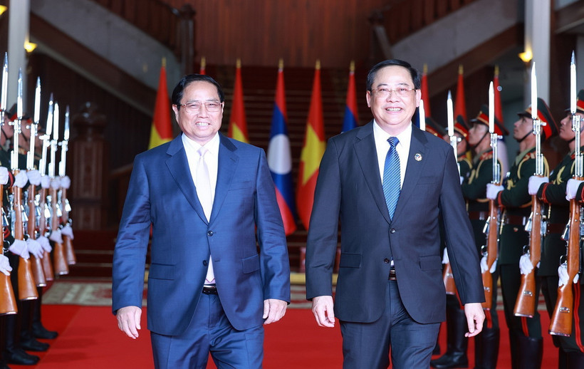 Thủ tướng Phạm Minh Chính hội kiến Thủ tướng Lào Sonexay Siphandone, Chủ tịch ASEAN 2024. (Ảnh: Dương Giang/TTXVN)