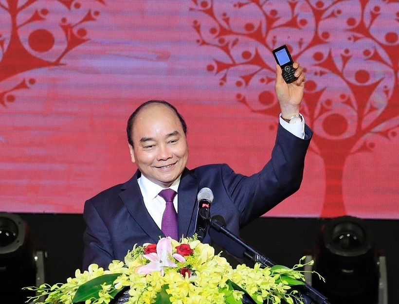 Thủ tướng Nguyễn Xuân Phúc nhắn tin ủng hộ Tết vì người nghèo và nạn nhân chất độc da cam. (Ảnh: Thống Nhất/TTXVN)