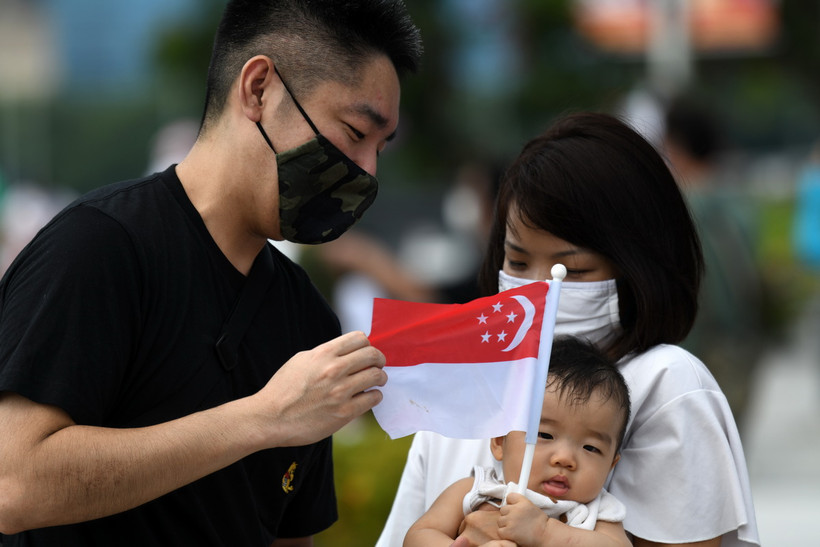 Người dân Singapore. (Ảnh: AFP/ TTXVN)