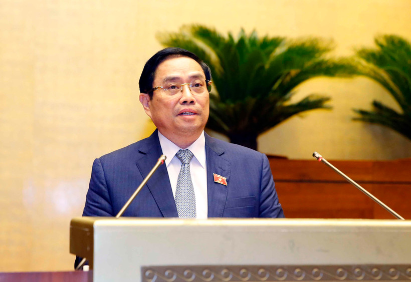Thủ tướng Phạm Minh Chính trình Quốc hội về cơ cấu tổ chức của Chính phủ nhiệm kỳ 2021-2026. Ảnh: Doãn Tấn/TTXVN)