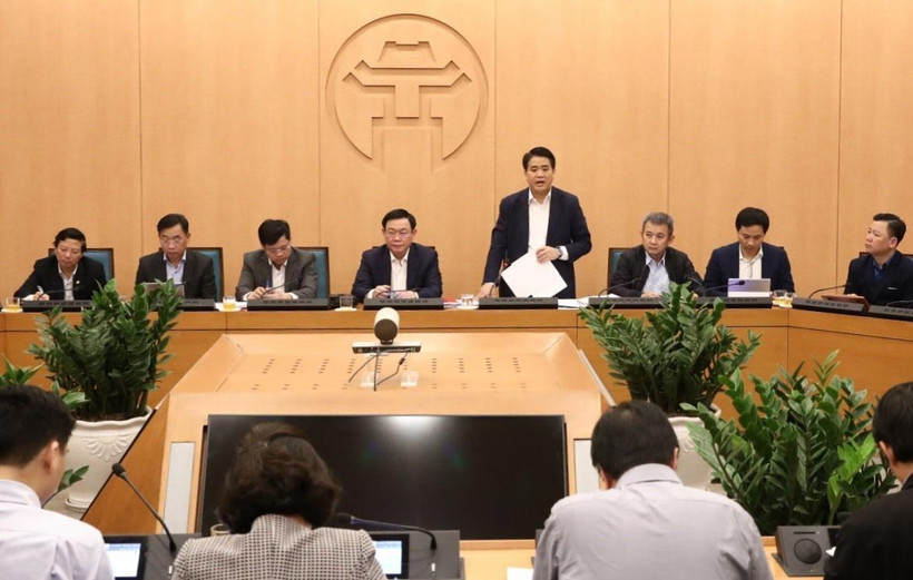 Chủ tịch UBND thành phố, Trưởng ban Chỉ đạo phòng, chống dịch COVID-19 Hà Nội Nguyễn Đức Chung phát biểu tại cuộc họp. (Ảnh: Văn Điệp/TTXVN)