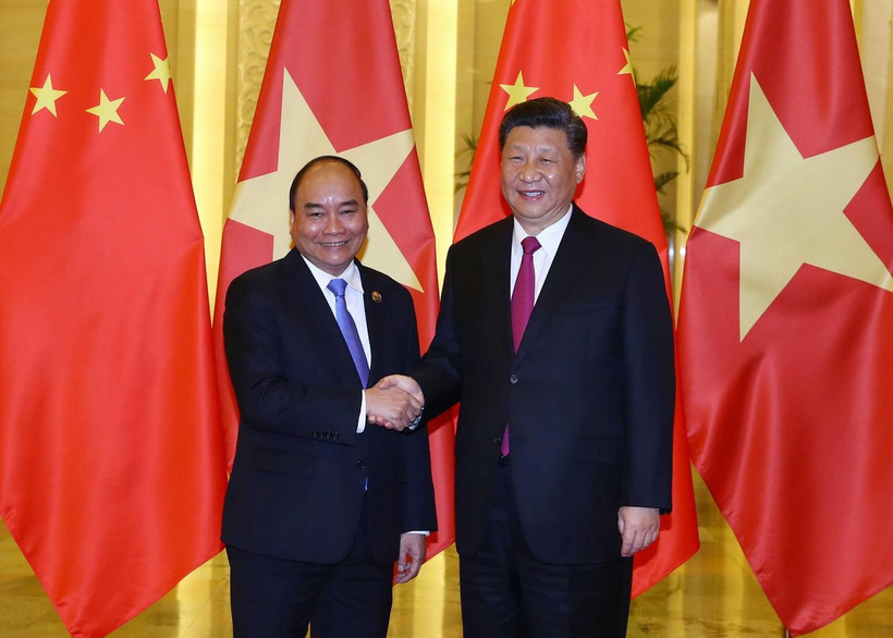 Thủ tướng Nguyễn Xuân Phúc hội kiến Tổng Bí thư, Chủ tịch nước Trung Quốc Tập Cận Bình. (Ảnh: Thống Nhất/TTXVN)
