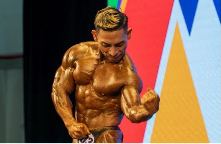 Lực sỹ Phạm Văn Mách. (Ảnh: Khánh Hòa/TTXVN)