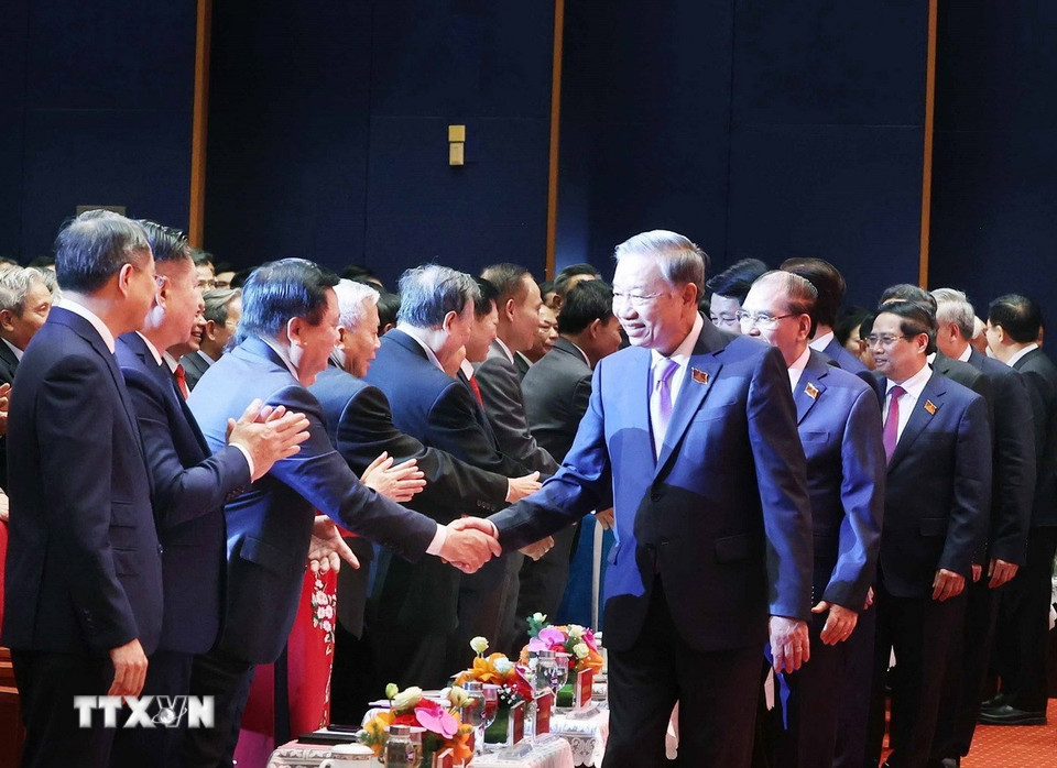 Tổng Bí thư Tô Lâm với các đại biểu tham dự buổi lễ. (Ảnh: Thống Nhất/TTXVN)