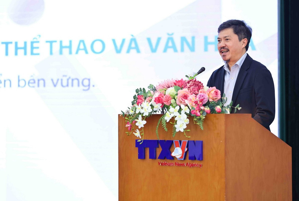 Tổng Biên tập Báo Thể thao &amp; Văn hóa Lê Xuân Thành trình bày tham luận. (Ảnh: Minh Đức/TTXVN)