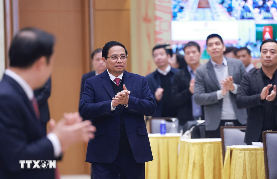 Thủ tướng Phạm Minh Chính đến Phiên họp tổng kết hoạt động của Ủy ban và Đề án 06. (Ảnh: Dương Giang/TTXVN)