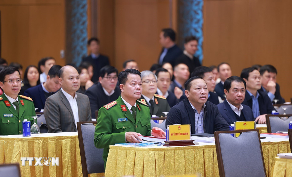 Các đại biểu tham dự Phiên họp tổng kết hoạt động của Ủy ban và Đề án 06. (Ảnh: Dương Giang/TTXVN)