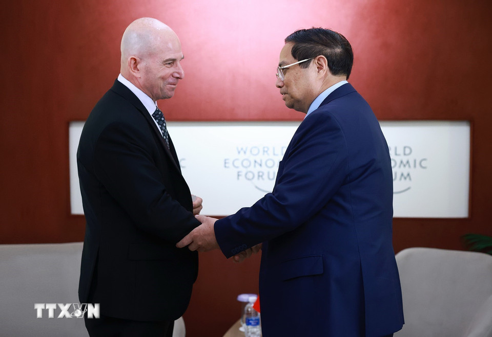 Thủ tướng Phạm Minh Chính tiếp ông Dave West, Chủ tịch Tập đoàn Cisco. (Ảnh: Dương Giang/TTXVN)