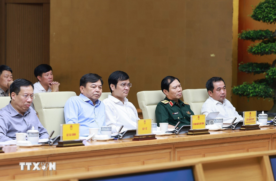 Các thành viên Ban Chỉ đạo Phòng thủ dân sự quốc gia tham dự phiên họp. (Ảnh: Dương Giang/TTXVN)