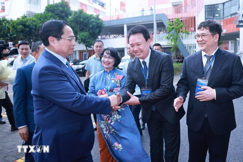 Thủ tướng Phạm Minh Chính đến dự Lễ công bố quyết định chuyển đổi mô hình từ Trường Đại học Phenikaa thành Đại học Phenikaa. (Ảnh: Dương Giang/TTXVN)
