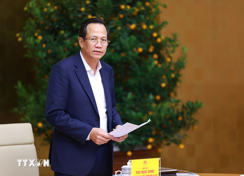 Bộ trưởng Bộ Lao động-Thương binh và Xã hội Đào Ngọc Dung báo cáo kết quả triển khai xóa nhà ﻿tạm, nhà dột nát trên phạm vi cả nước. (Ảnh: Dương Giang/TTXVN)