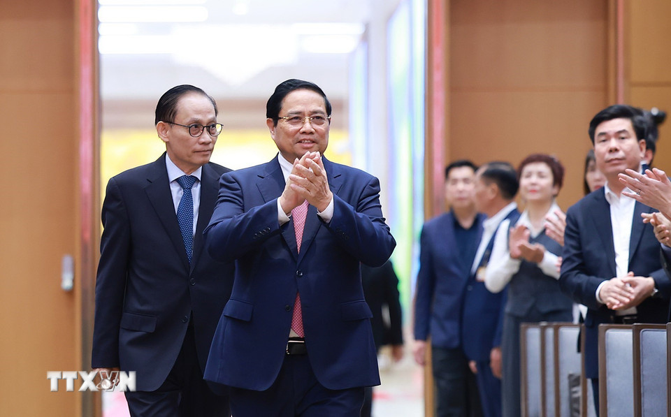 Thủ tướng Phạm Minh Chính đến dự Hội nghị toàn quốc tổng kết công tác đối với người Việt Nam ở nước ngoài. (Ảnh: Dương Giang/TTXVN)