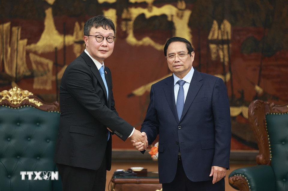 Thủ tướng Phạm Minh Chính tiếp ông Hyoung Nyon Kim, Phó Chủ tịch Tập đoàn Dunamu của Hàn Quốc. (Ảnh: Dương Giang/TTXVN)