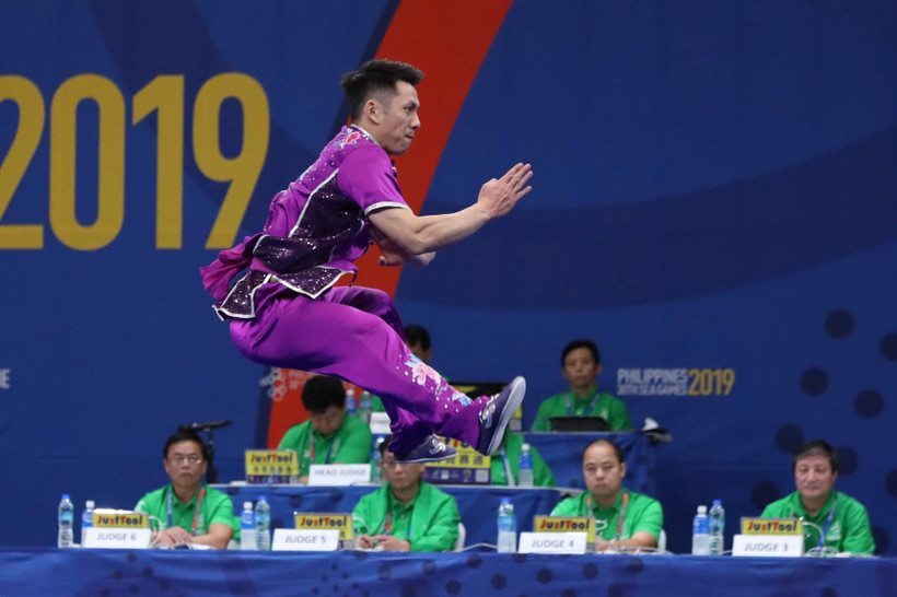 Trần Xuân Hiệp thi đấu nội dung trường quyền nam. (Ảnh: Hoàng Linh/TTXVN)